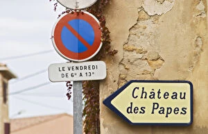 Road sign showing the way to the ruins of the chateu Popes old summer palace