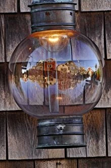 Rockport, Massachusetts reflected in lamp globe, Rockport, Massachusetts
