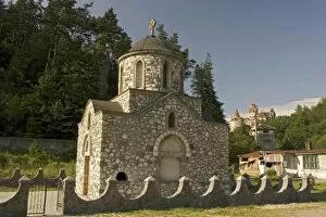 Romania, Brasov, Bran, The old church below the Bran Castle and Bran Castle in the