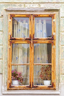 Images Dated 2nd March 2024: Romania, Bucharest. Window with flowering plants