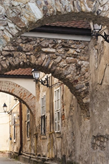 Images Dated 19th May 2014: Romania, Maramures Region, Baia Mare, Piata Libertatii Square, stone building arches
