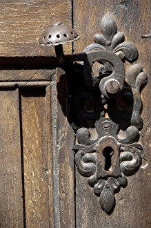 Brasov Prints: Romania, Transylvania, Brasov. The Black Church, detail of wooden door with iron latch