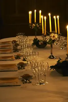 Images Dated 11th August 2015: A romantic table set for wine tasting and dinner with many glasses and candelabra