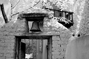 Black And White Prints: Rough adobe bell in entryway, Santa Fe, New Mexico, USA