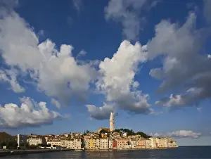 Images Dated 16th May 2007: Rovigno skyline and Cathedral of St. Euphemia reflected on Adriatic Sea at sunrise