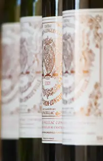 A row of bottles standing in line - Chateau Baron Pichon Longueville, Pauillac, Medoc