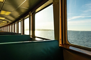 Prints of Row of seats and window view of Puget Sound on the Spokane ferry, Seattle, Washington State, USA Images Dated 2024 October: Row of seats and window view of Puget Sound on the Spokane ferry