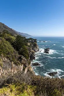 Sheila Haddad Prints: The rugged coastline of Big Sur with wisps of fog drifting into the hills