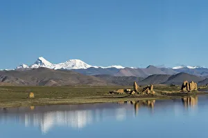 Prints of Ruins by a lake on Tibetan Plateau, Dhaulagiri (8167m) in the distance on the left, Shigatse Prefecture, Tibet, China Asia Prints: Ruins by a lake on Tibetan Plateau, Dhaulagiri (8167m) in the distance on the left