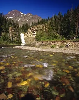 Running Eagle Falls aka Trick Falls in the Two Medicine Valley of Glacier National
