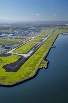 Shoreline Prints: Runway at Auckland Airport, and Manukau Harbour, North Island, New Zealand - aerial