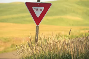 Rural sign near field of Wheat, Palouse Area of Eastern WA near town of Steptoe, USA