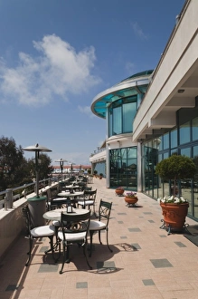 Russia, Black Sea Coast, Sochi, Lighthouse Beach, Primorskaya Street, cafe tables