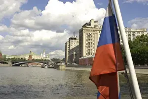 Russia. Moscow. Russian flag and the Moscow River from a tour boat