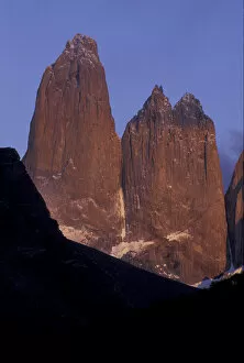 SA, Chile, Torres del Paine National Park. Morning light on Torre Sur and Torre Central