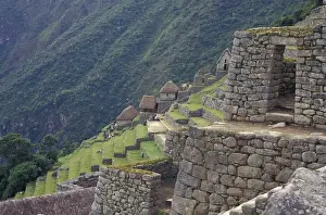 Mountainside Prints: SA, Peru, Machu Picchu Stone walls and terraces of ruin high in Andes Mountains