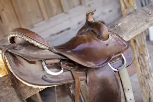 Saddle Prints: Saddle resting on the railing, Tucson, Arizona, United States