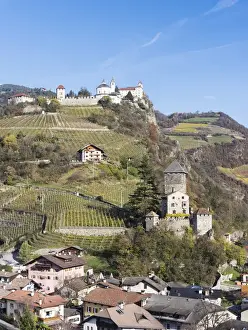 Saeben Monastery and Branzoll Castle near Klausen in the Eisack Valley during autumn