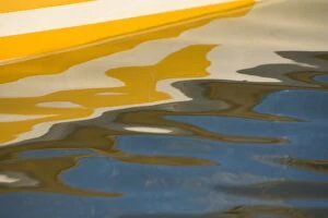 Sailboat hull and reflection in Caribbean Sea, Placencia, Stann Creek District, Belize