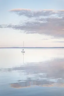 Images Dated 31st January 2020: Sailboat and morning clouds reflected in calm waters of Bellingham Bay, Washington State