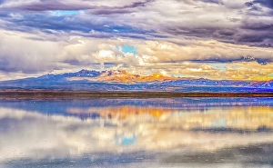Bolivia Prints: Salar de Uyuni, Bolivia. Wide angle landscape view of storm clouds reflected over the Salar de Uyuni