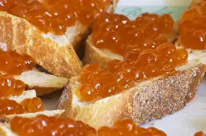 Salmon eggs on a piece of bread Caviar et Prestige Saint Sulpice et Cameyrac Entre-deux-Mers