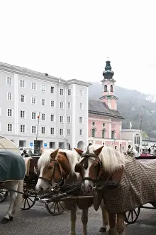 Recreational Activity Prints: Salzburg, Salzburg, Austria - Horses and horse-drawn carriages in an old world setting
