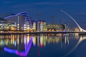 Downtown Prints: Samuel Beckett bridge at dusk over the River Liffey in downtown Dublin, Ireland