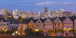Images Dated 2029: San Francisco California Painted Ladies Victorian homes and city in background