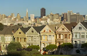 Images Dated 2029: San Francisco California Painted Ladies Victorian homes and city in background