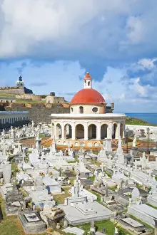 Old San Juan Prints: San Juan, Puerto Rico - An orange dome tops a building in a cemetery. In the background