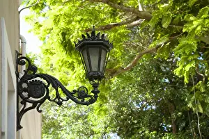Low Angle Prints: San Juan, Puerto Rico - A Spanish Colonial style ornate lam is mounted on the exterior