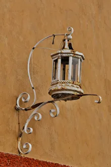 Images Dated 6th March 2015: San Miguel De Allende, Mexico. Lantern and shadow on colorful buildings