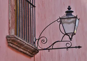 Images Dated 6th March 2015: San Miguel De Allende, Mexico. Lantern and shadow on colorful buildings