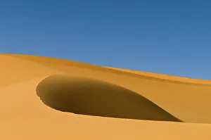 Barren Prints: Sand dunes in the Sahara desert. Akakus, Fezzan, Libya