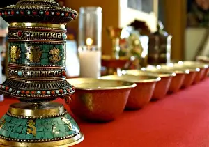 Tibetan Prints: Santa Fe, New Mexico, USA. Tibetan ceremonial prayer wheel and bowls