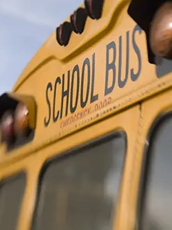 Safety Prints: Santa Maria de Jesus, Guatemala. Former American school buses, which now serve as