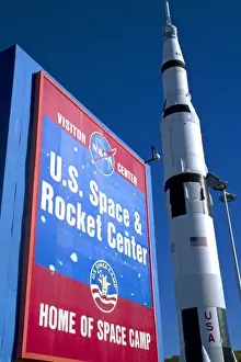 Science Prints: Saturn V mock-up stands next to the U