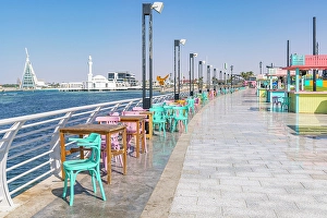 Multicolored Prints: Saudi Arabia, Mecca Province, Jeddah. Seating area on the waterfront in Jeddah
