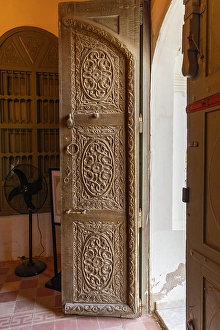 Makkah Prints: Saudi Arabia, Mecca Province, Jeddah. Ornately carved wooden door in the Al-Balad district