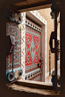 Multicolored Prints: Saudi Arabia, Riyadh. Colorfully painted window in Najd Village. (Editorial Use Only)