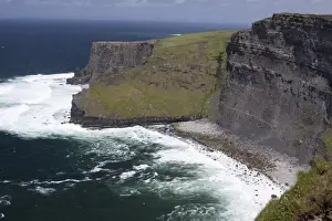 Popular Prints: Scenic Cliffs of Moher and beach with the Atlantic Ocean and choppy waves