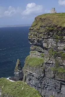Images Dated 25th May 2009: Scenic Cliffs of Moher and O Briens Tower under a blue sky and white puffy