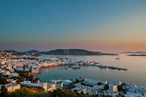 Yacht Prints: A scenic view of Chora and the nearby sea at sunset