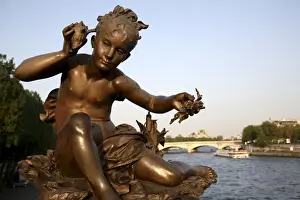 Alexandre Iii Prints: The sculpture on the Pont Alexandre III with River Seine in the background. Paris. France