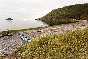 Danita Delimont New Images May 2025 Prints: Sea kayak on the shore of Bowman Bay, Deception Pass State Park, Washington State, USA