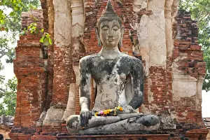 Deity Prints: Seated Buddha statue at the temple of Wat Mahatat in Ayutthaya near Bangkok, Thailand