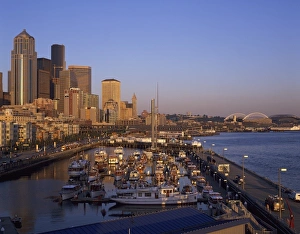 Sky Line Prints: Seattle at Dusk. classic yachts fill the Bell Town Marina. Seattle, WA