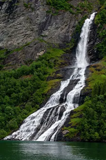 Seven Sisters Prints: Seven Sisters waterfalls cascades off sheer cliffs into Geirangerfjord, Norway