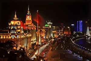China Gallery: Shanghai China Bund at Night Cars, Flags Trademarks Obscured